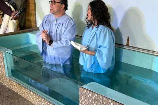 Praying together before a baptism