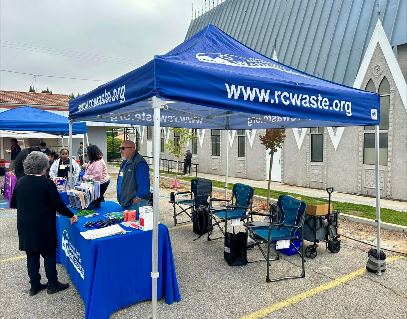 Health fair booths beside the church